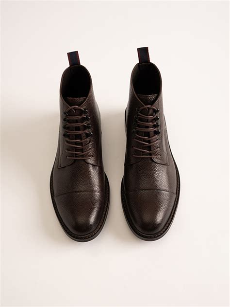 gucci pebbled lace up boots|Gucci boots customer service.